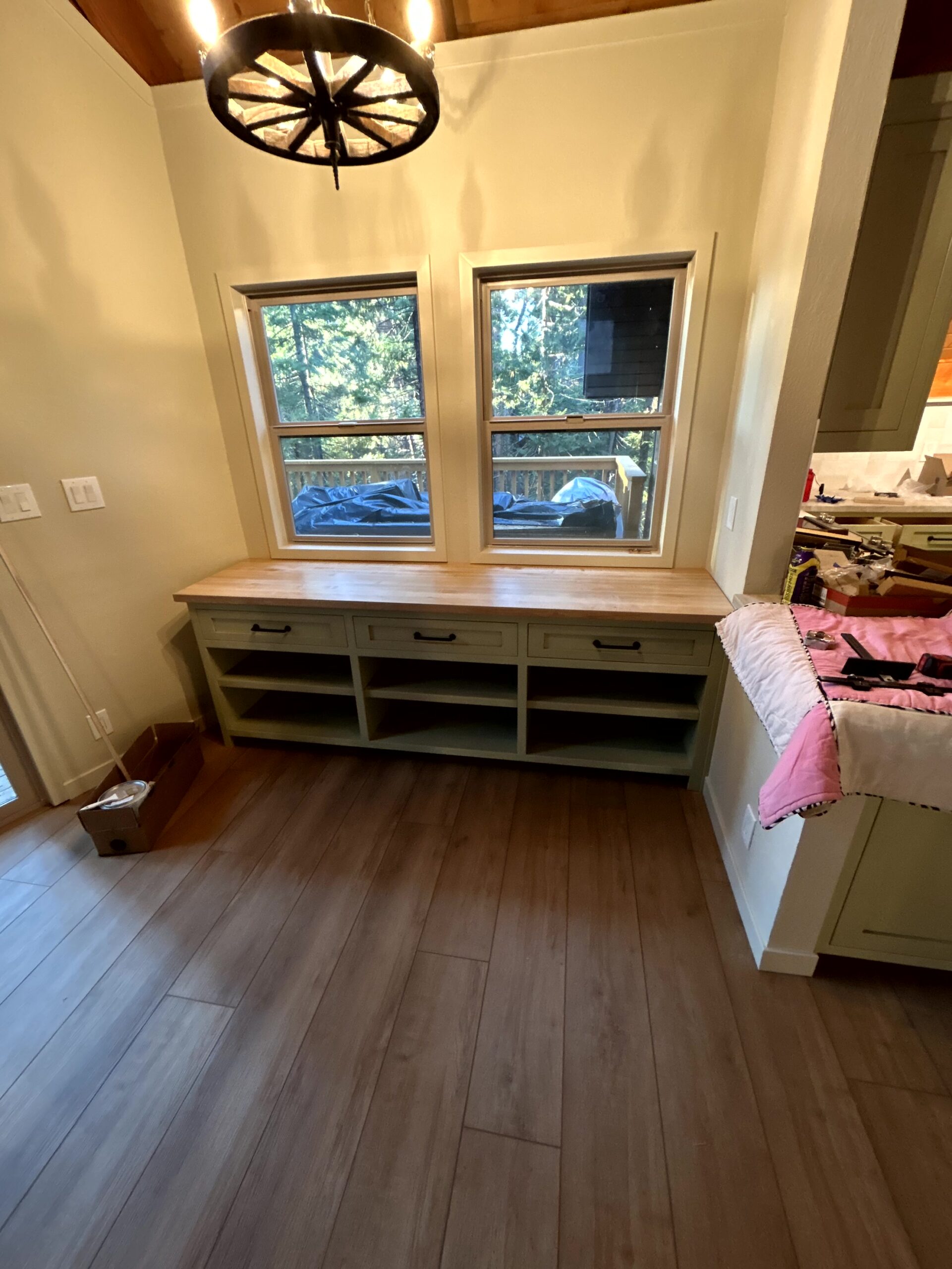 Waterman-Construction-Custom Waterman Construction custom built window bench with drawers and open shelving.